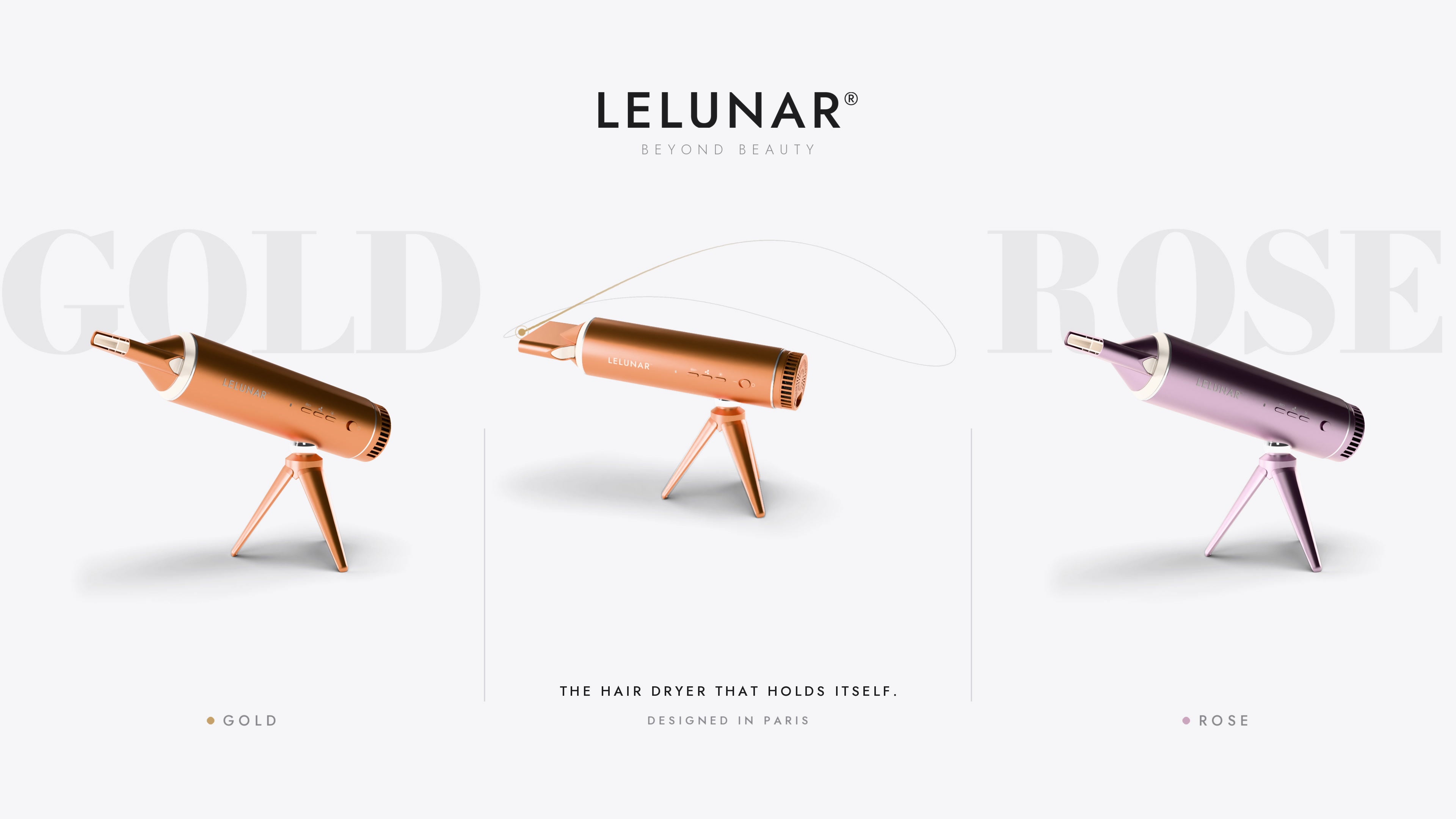 LELUNAR HandsFreeDryer film — the dryer turns a full circle on its ball head; Gold and Rose beside it