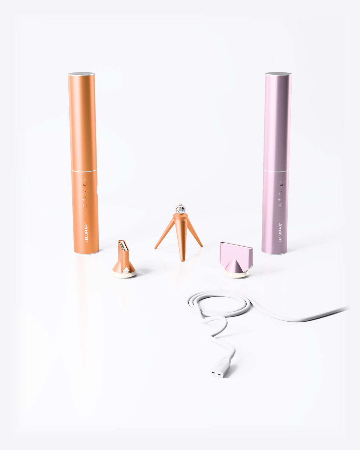 LELUNAR HandsFreeDryer in gold standing on its own tripod, with the capsule, the cup and the cord